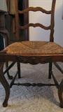 Ladder back chair with woven rush seat