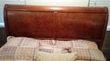 Wooden headboard - be careful, it'll leave a mark.