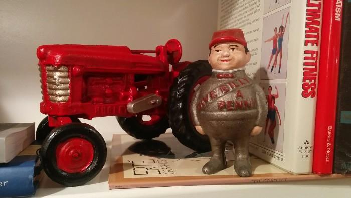 Billy needs a penny - please give him one                                Vintage Hubley cast iron tractor