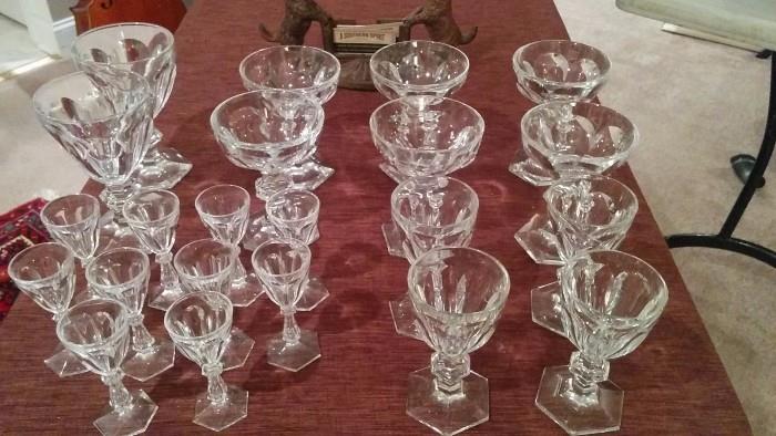 Baccarat Harcourt Stemware: 2 Water Glasses, 4 Sherbets/Champagne coupes, 4 Sherrys and 10 Codials.