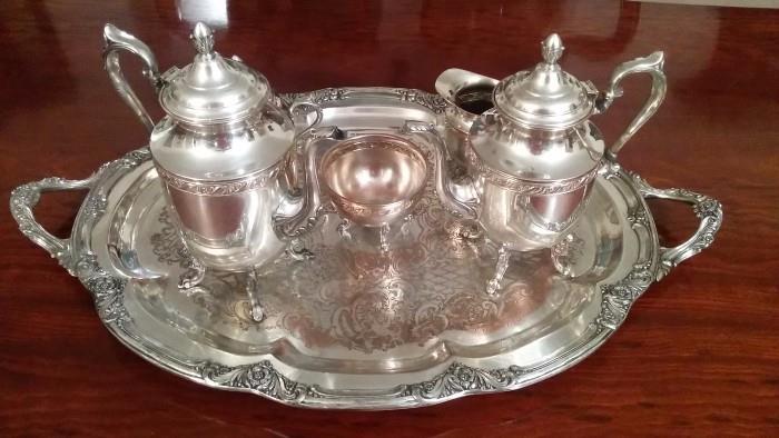 6-Piece Silver Plated Tea service.                                        This this is ULTRA heavy! The tray measures 31" handle-to-handle.                                                                                                                  This is the rear view - scroll forward to see the front view.