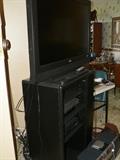Sanyo flat screen TV, stand, VCR & DVD