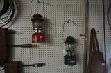 vintage Coleman 200A red lantern, vintage green Coleman 200A700 lantern
