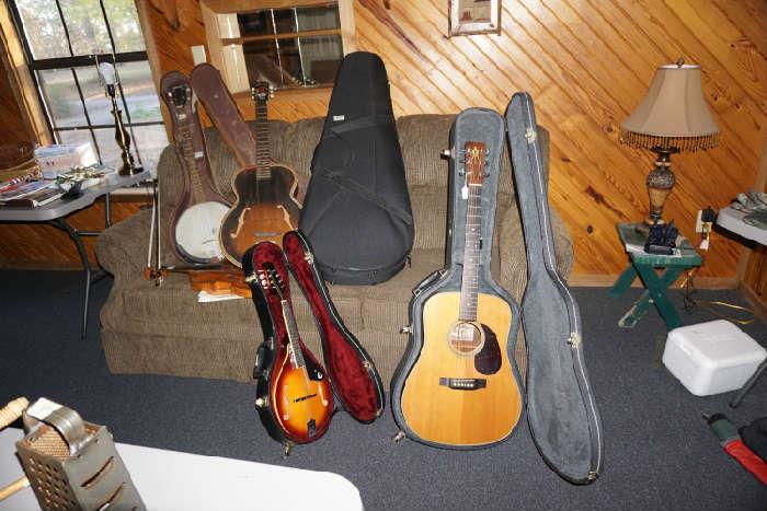Assorted musical instruments & cases, hide-a-bed couch