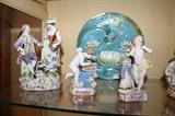 Meissen courting couple figurine (the plate and the Meissen Cupid figurines are sold)