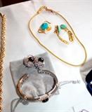 18k yellow gold and sterling silver bracelet and earrings. 22k yellow gold and turquoise earrings and necklace with pendant