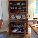 Antique pine cabinet with fruit designs on doors c 1850 provincial French with assorted Meissen 18th century and Stafforshire china pieces