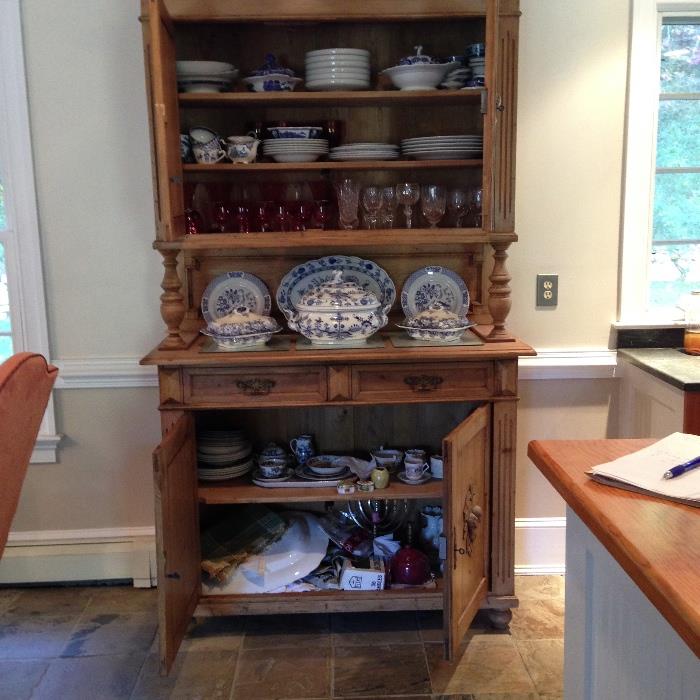 Antique pine cabinet with fruit designs on doors c 1850 provincial French with assorted Meissen 18th century and Stafforshire china pieces