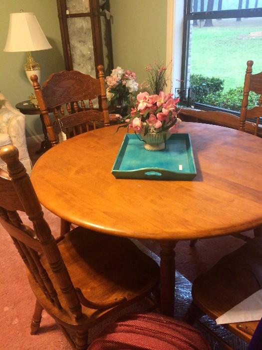 Round oak  table; 4 matching chairs