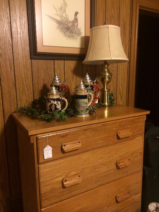 Ranch Oak chest of drawers; German steins