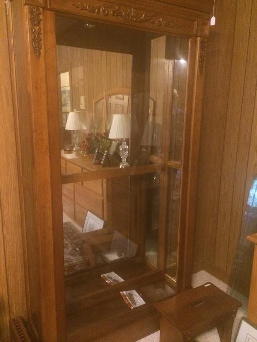 Display cabinet opens on the sides.