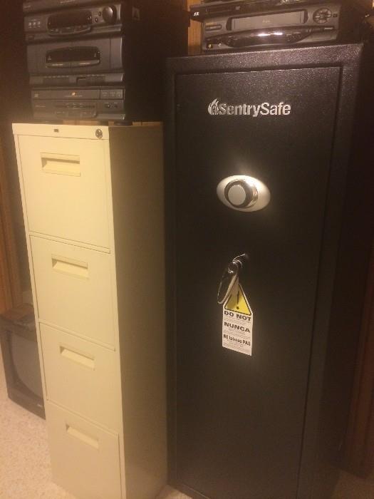 CD player, four drawer file cabinet, and Sentry Safe