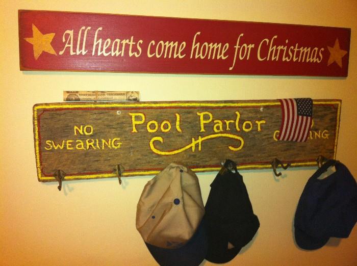 wall sign and hat rack