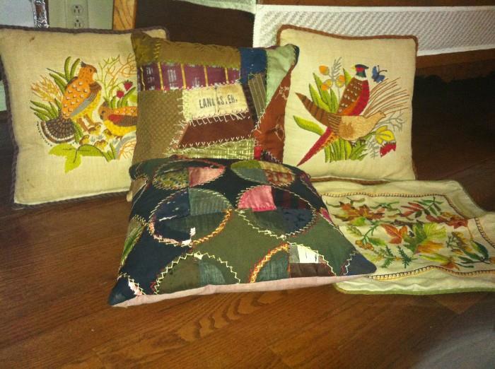 various hand stitched pillows
