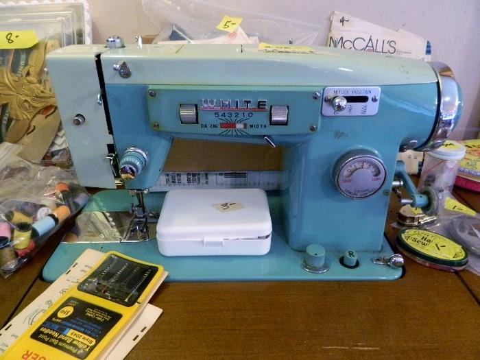White turquoise sewing machine