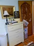 Chest of drawers, pictures, lamp