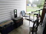 Two heavy duty tool boxes w/contents, bicycle, school desk