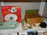 Nikko new in box dinnerware, Vintage roly-poly glass set, hat pins, Zippo lighters, Cast iron Amish match holder, jewelry