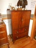 This is a great antique cabinet / chest for various uses