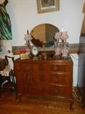 As you will note this is a wonderful solid wood dresser with oval mirror