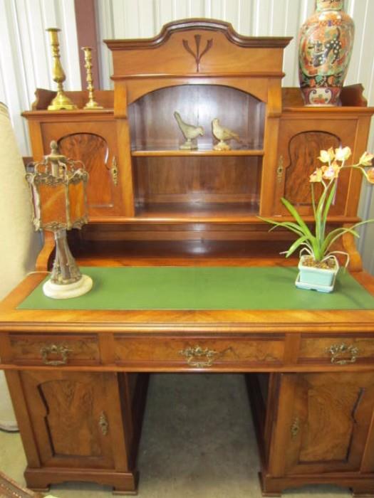 Beautiful antique desk with walnut veneers. It breaks down into 4 pieces for easy moving. 57" X 33" X 66"H