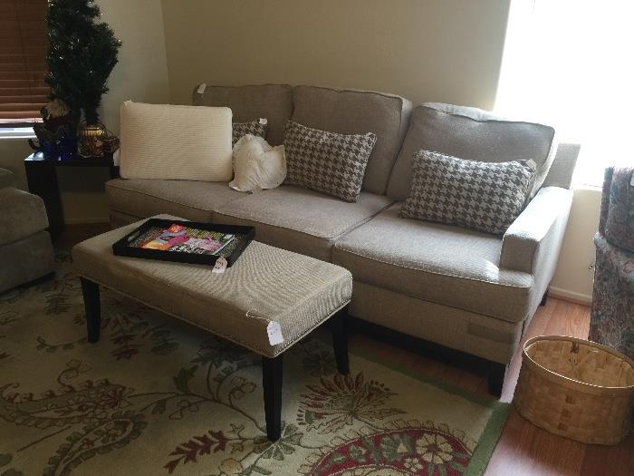Beige couch with ottoman 