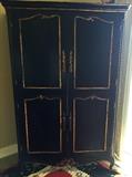 Period antique armoire repainted and made into a bar!