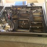 Collection of sterling sugar cube holders and other sterling items.