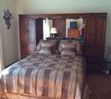 Clean Queen Bedroom Set has nice wood headboard, long dresser hutch with mirror (not pictured) and tall dresser (not pictured).  