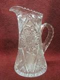 11" tall and 9" handle to spout American Brilliant Period Cut Glass Pitcher with a Hobstar.