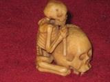 Rare Meiji Period Carved Ivory Okimono CA late 1800's Skeleton riding Skull