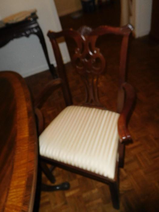 One of 12 quality Chippendale chairs