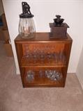 book shelf, butter churn and coffee mill