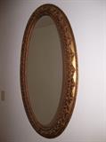oval gilded mirror