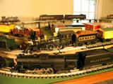 This show some of the Lionels on their approximately 16 X 8 foot layout.
