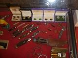 Cufflinks, pocket knives
