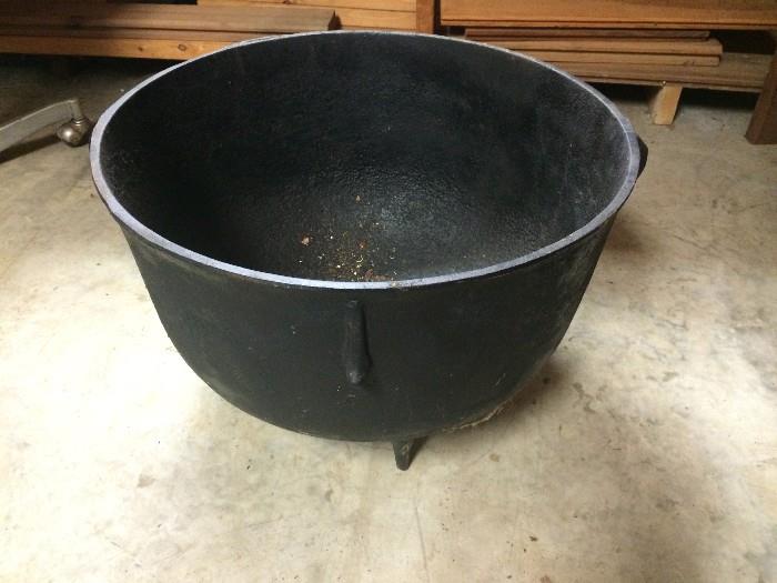 Huge footed cast-iron kettle with very small amount of rust in bottom and no cracks
