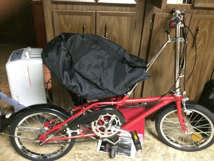 A pair of brand-new Dalton portable bicycles