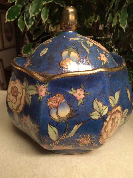 Lovely painted porcelain covered urn