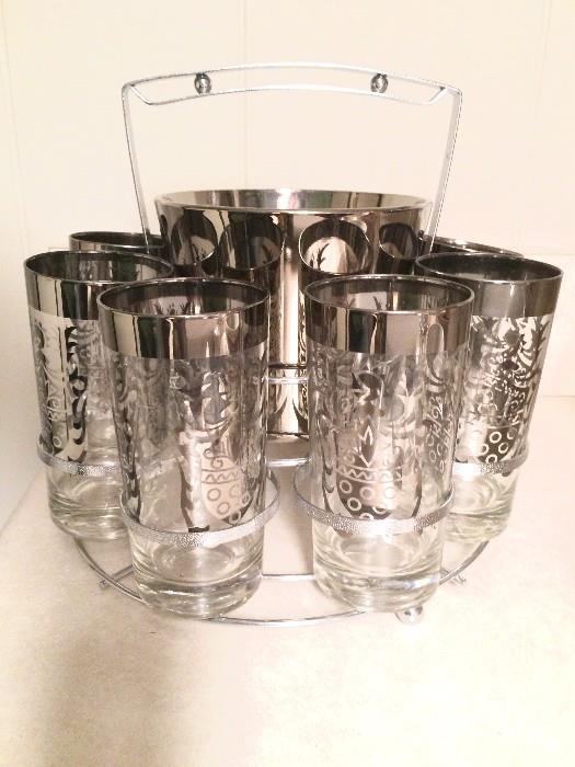 Gorgeous set of silver-rimmed vintage Christmas tumblers with matching ice bucket and holder