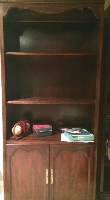 Another tall bookcase with storage and display