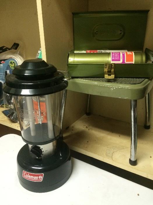 Coleman camping lantern, never used, and propane kit, plus avocado vintage Cosco step stool in background