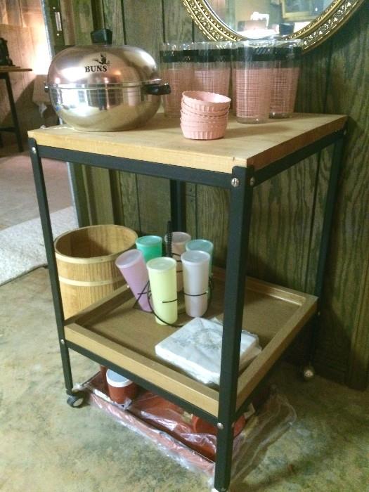 A second two-tier butcher block on casters