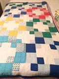 Hand-sewn quilt