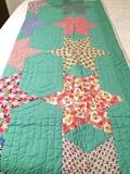 Hand-sewn wedding-ring quilt great condition