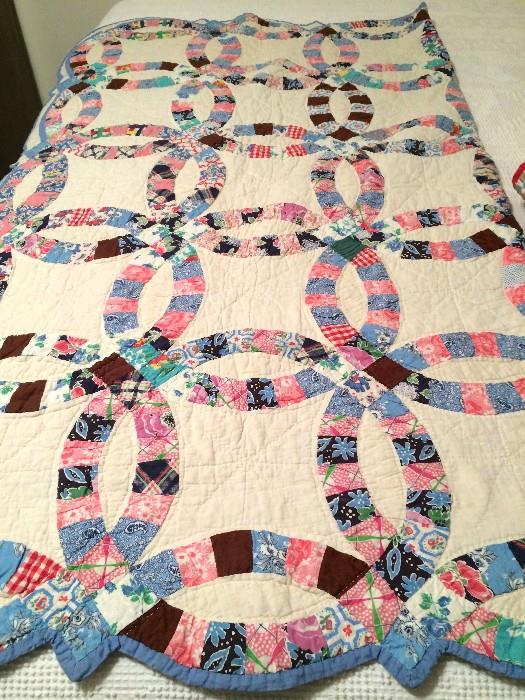 Hand-sewn wedding-ring quilt great condition