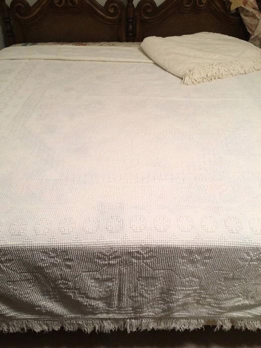 A second vintage coverlet with fringe