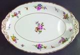 Haviland china 5-piece place setting, service for 12. One cracked cup and one cracked salad plate. Always hand washed. Gold rim is intact. Virtually no surface scratching. 
