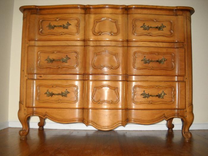 French provincial style solid English walnut chest of drawers. Hand carved. Lacquer finish.