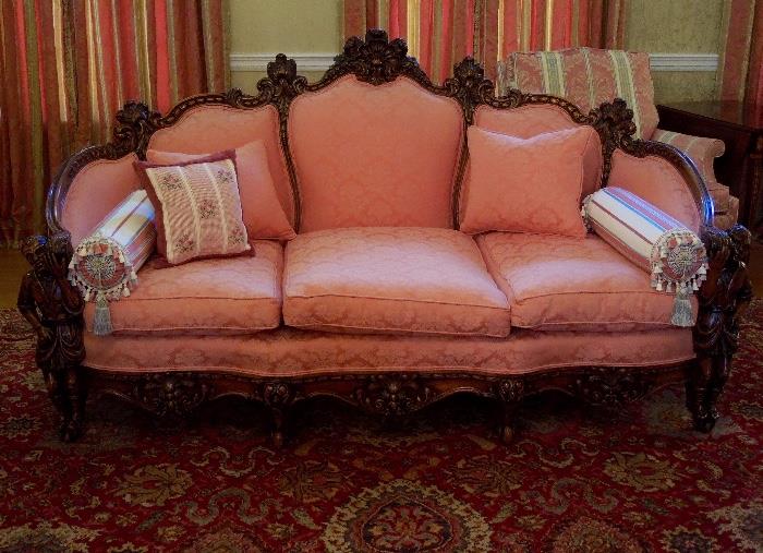 Antique Figural Carved Sofa Covered in Silk Damask Fabric